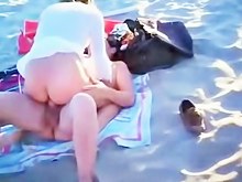Swingers couples on the beach